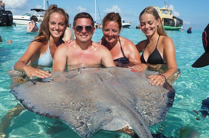 Stingray City and Coral Gardens - Stop 1: Stingray City Sandbar in 2–5 feet of water